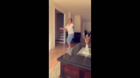 Mom goes right back to dancing after making sure kid is alright