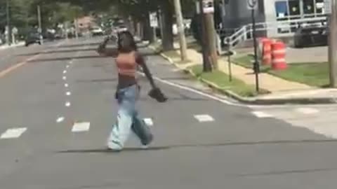 Woman pointing gun at people on New York streets gets SURPRISED by what the Police do next