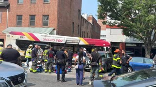 At least 15 injured after bus crashes into Baltimore building