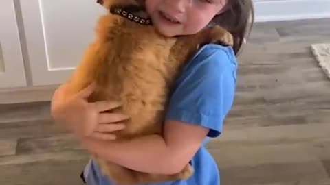 Little girl sobs as she holds her new puppy | Humankind