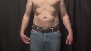 Fat man flexes his flab 5 of 14