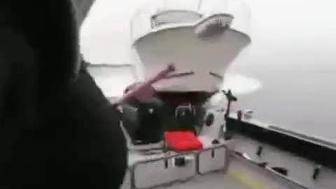 TRY NOT YO LAUGH!A dog driving a motor boat and causing an accident.