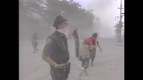 Crowds run for shelter during September 11th attacks in NYC