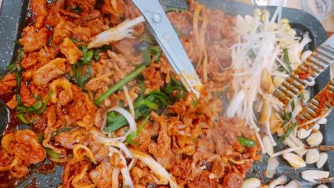 Korean seasoned meat on a griddle