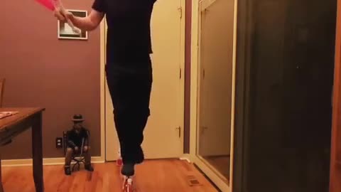 Man Walks on Row of Glass Bottles and Juggles Pins