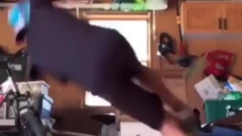 Boy falling while skating in the room