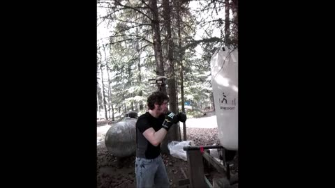 Canadian guy hits heavybag