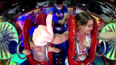 Slingshot ride with [little girl] and his mom