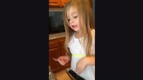 Toddler illustrates candy-making process