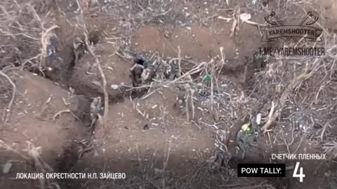 Russians take Ukrainian POW's in the trenches..