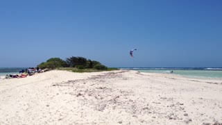 Kite Surfer Jumps Over Island, Lands Back On Water