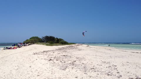 Kite Surfer Jumps Over Island, Lands Back On Water