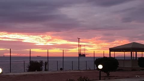 A wonderful view of the sunset from the oil fields of Fanar in Brass Ghareb in the Red Sea, Egypt