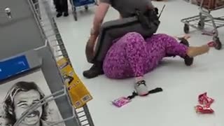 Police Officer tackles crazy woman as she causes Chaos & screams "Walmart is Racist!"