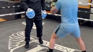 Ricky Hatton on the pads with son Campbell Hatton