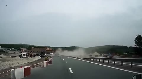 Truck Tips Over on Busy Highway