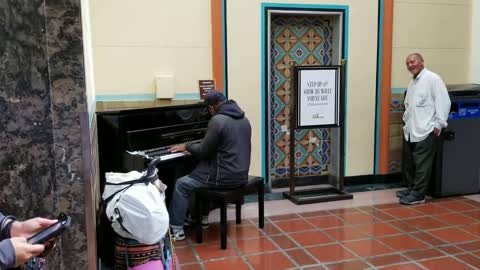 Random Stranger plays Peanuts Theme Song on Public Piano at Los Angeles Union Station