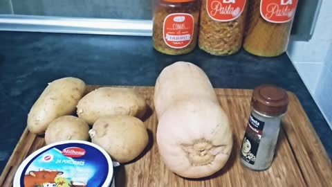 Spanish food/Soup potatoes and pumpkin /sausages with white wine. Puré de patatas y calabaza