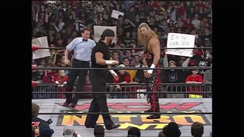 Goldberg confronts The nWo after the "Fingerpoke of Doom"