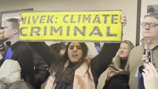Vivek Ramaswamy gets interrupted by climate protestors during a campaign event in Iowa