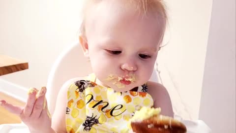 My Adorable Granddaughter Enjoying Her First Birthday Cupcake