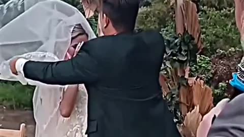 Groom kissing bride with all safety measures 😂😂😂