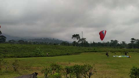 Paragliding in the garden, Kemuning Indonesia.