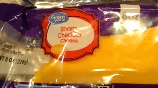 Eating Great Value Sharp Cheddar Cheese, Dbn, MI, 3/13/24