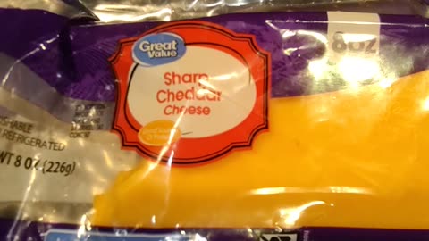 Eating Great Value Sharp Cheddar Cheese, Dbn, MI, 3/13/24