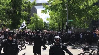 June 10 2017 Seattle 1.5 police pushing back ANTIFA with bikes so the march can start
