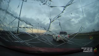 Flying Object Smashes Car Windshield