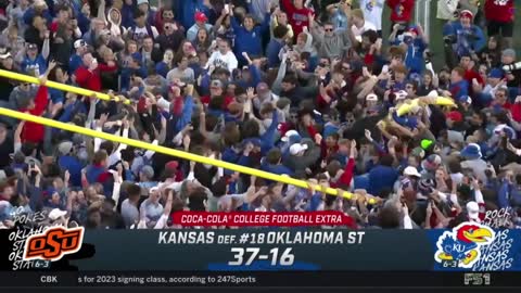 Kansas fans knock down goalposts after becoming bowl eligible for the 1st time since 2008