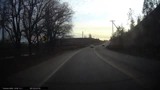 Car Crosses Centre Line Into Oncoming Traffic