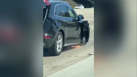 Woman driving on freeway with only 3 wheels