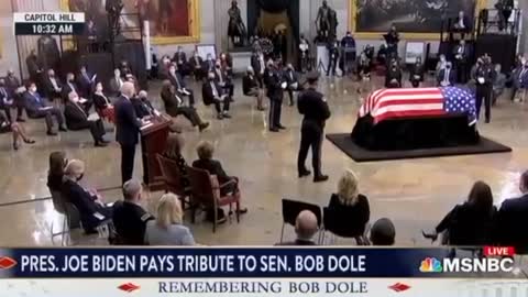 Biden reads the instructions at Bob Dole's funeral