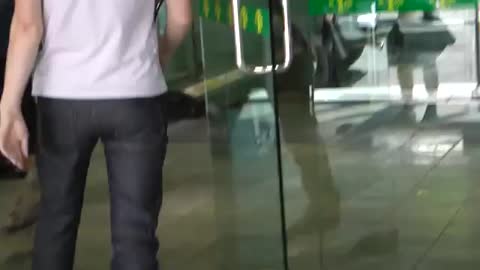 A bird confused going the wrong way on an escalator