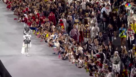 3 mile torch ferry man opening ceremony Olympic Paris 2024