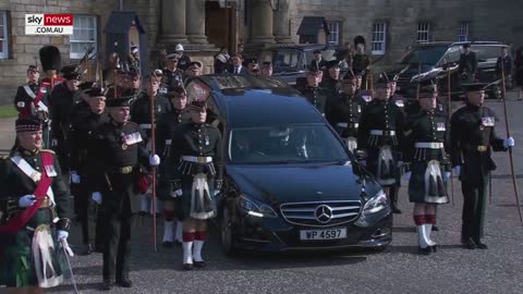 The Queen's coffin procession to St Giles' Cathedral begins