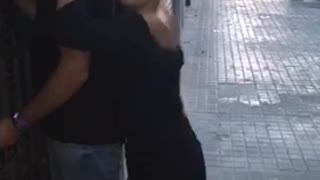 Woman tries to jump on man back