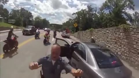 Biker Wheelies Into Unmarked Cop Car