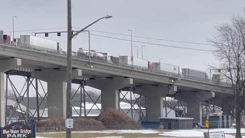 Freedom Convoy update: Blue Water Bridge in Sarnia, Ontario, Canada is blocked at the U.S./Canada border. Truckers are calling the factory workers to strike as well in support