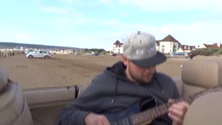 Practicing guitar on the beach!!!