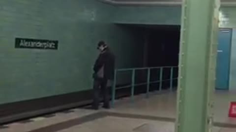 Man pees on train tracks at subway station