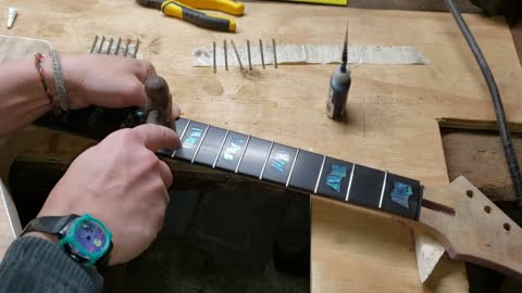 Installing, dressing, leveling & crowning frets on a custom metallica inspired handmade guitar