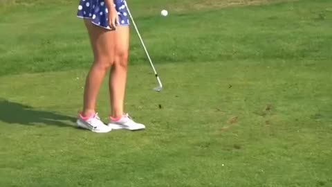 Queen@ golf shot