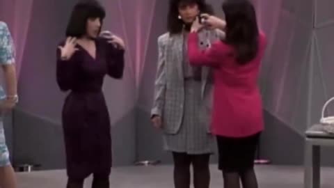 The Oprah Winfrey Show encourages shoulder pads for a better figure