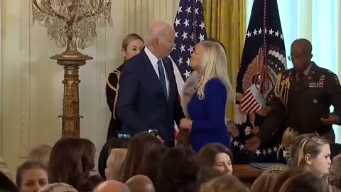 Joe Biden was spotted about to kiss another woman until Jill Biden stopped him