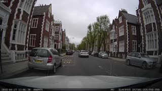 Woman Blocks Street Parking Spot