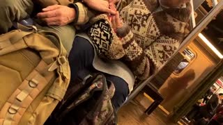 Woman filing old mans nails