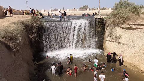 Egyptians Swim In Waterfalls Of Wadi El Rayan